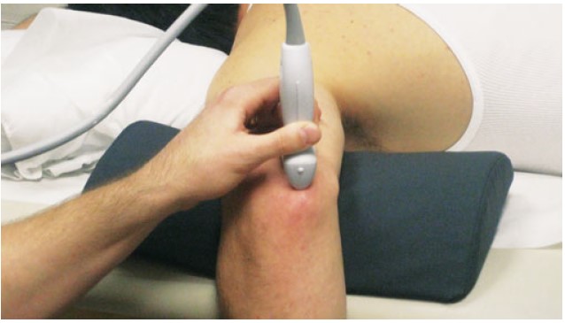 File:Alternative patient positioning for olecranon bursa aspiration injection.jpg